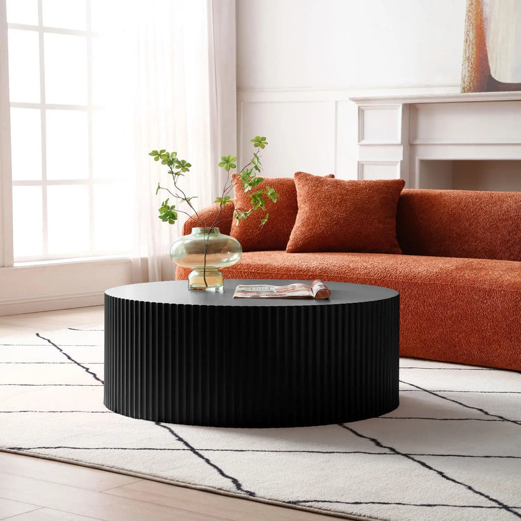 Sleek and Modern Round Coffee Table by Blak Hom Blak Hom